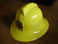 yellow plastic fireman helmet