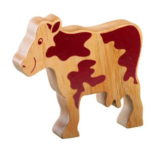 A chunky wooden cow figure